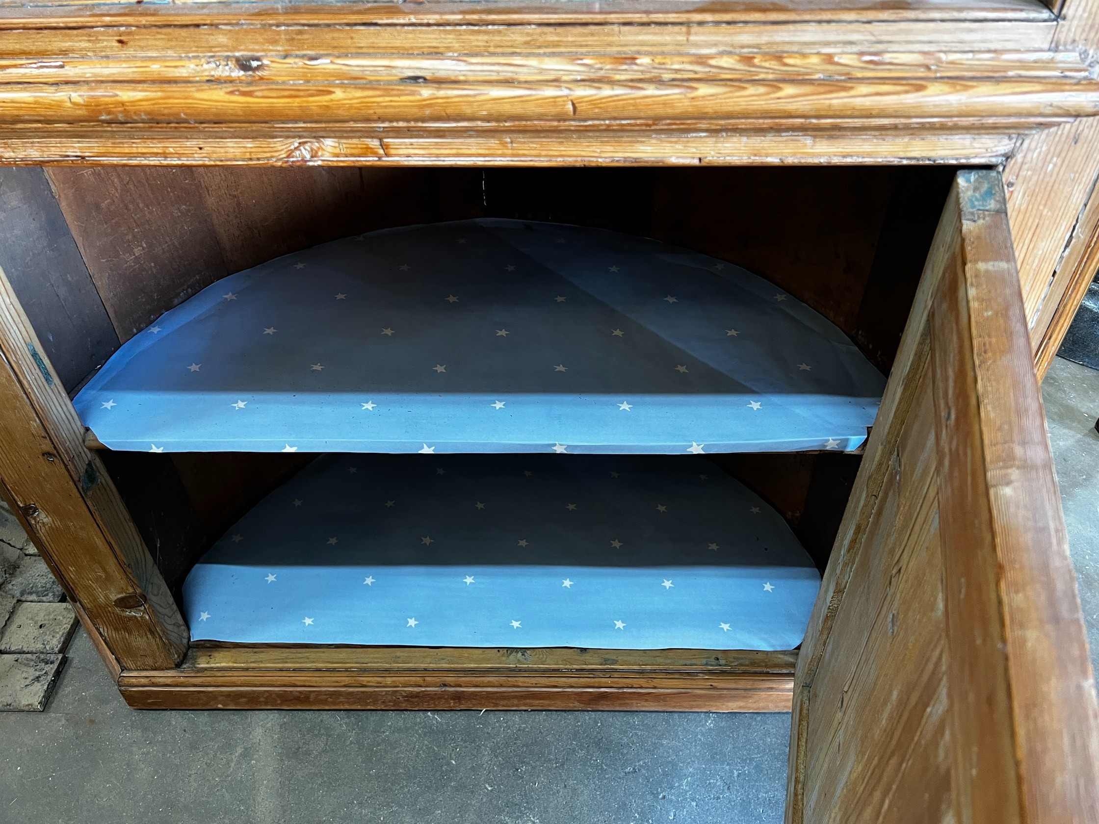 A George III pine barrel back standing corner cabinet, width 116cm depth 50cm height 220cm